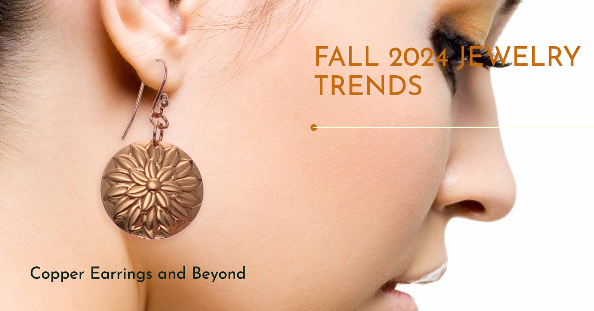 Close-up of a woman wearing a detailed copper earring with the text Fall 2024 Jewelry Trends: Copper Earrings and Beyond