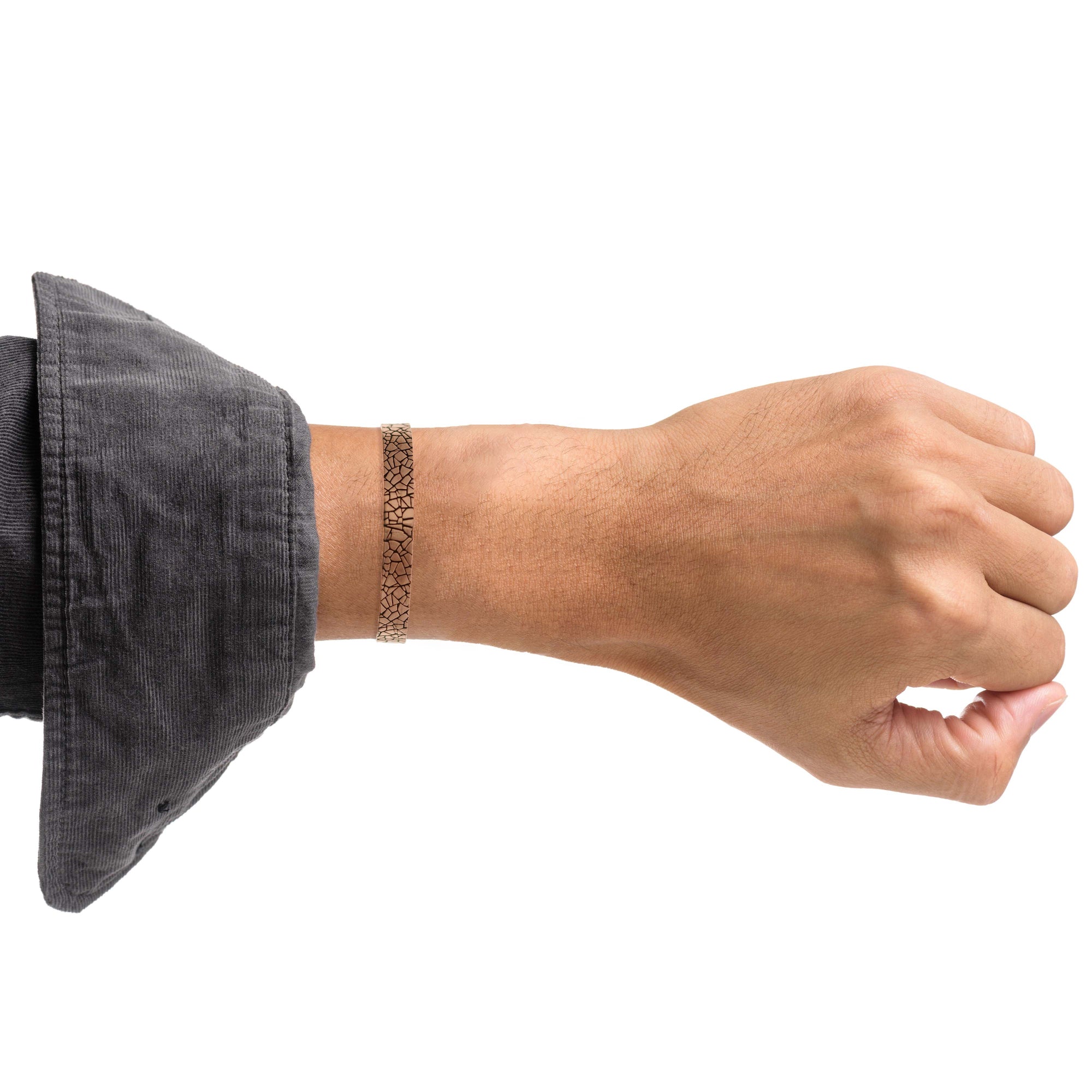 10mm Wide Men's Embossed Mosaic Solid Copper Cuff on Male Model's Wrist Wearing Gray Shirt