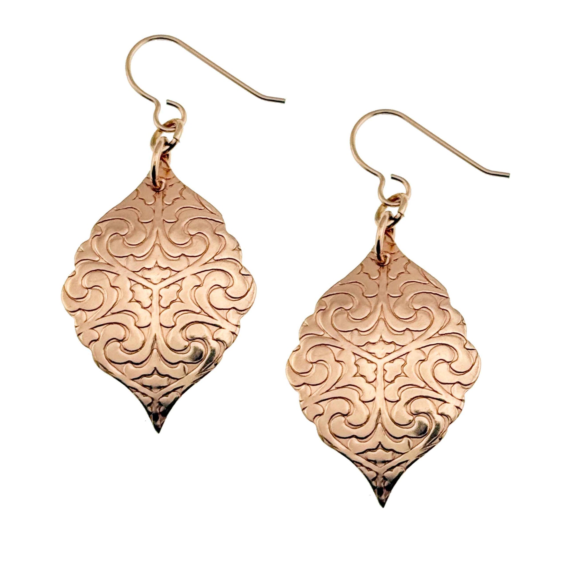 A Pair of Damask Embossed Bronze Moroccan Drop Earrings on a White Background