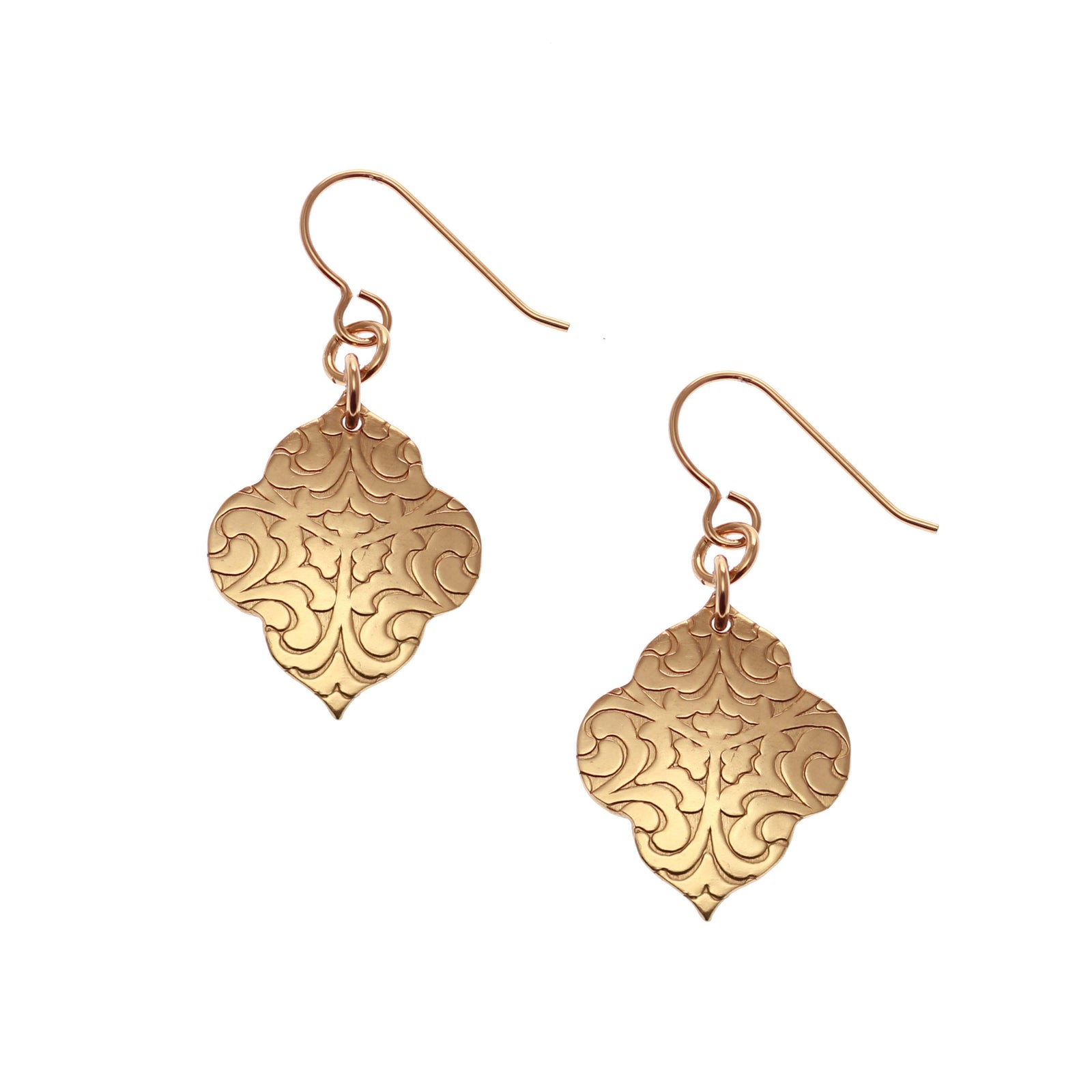 A Pair of Damask Embossed Bronze Quatrefoil Drop Earrings on a White Background