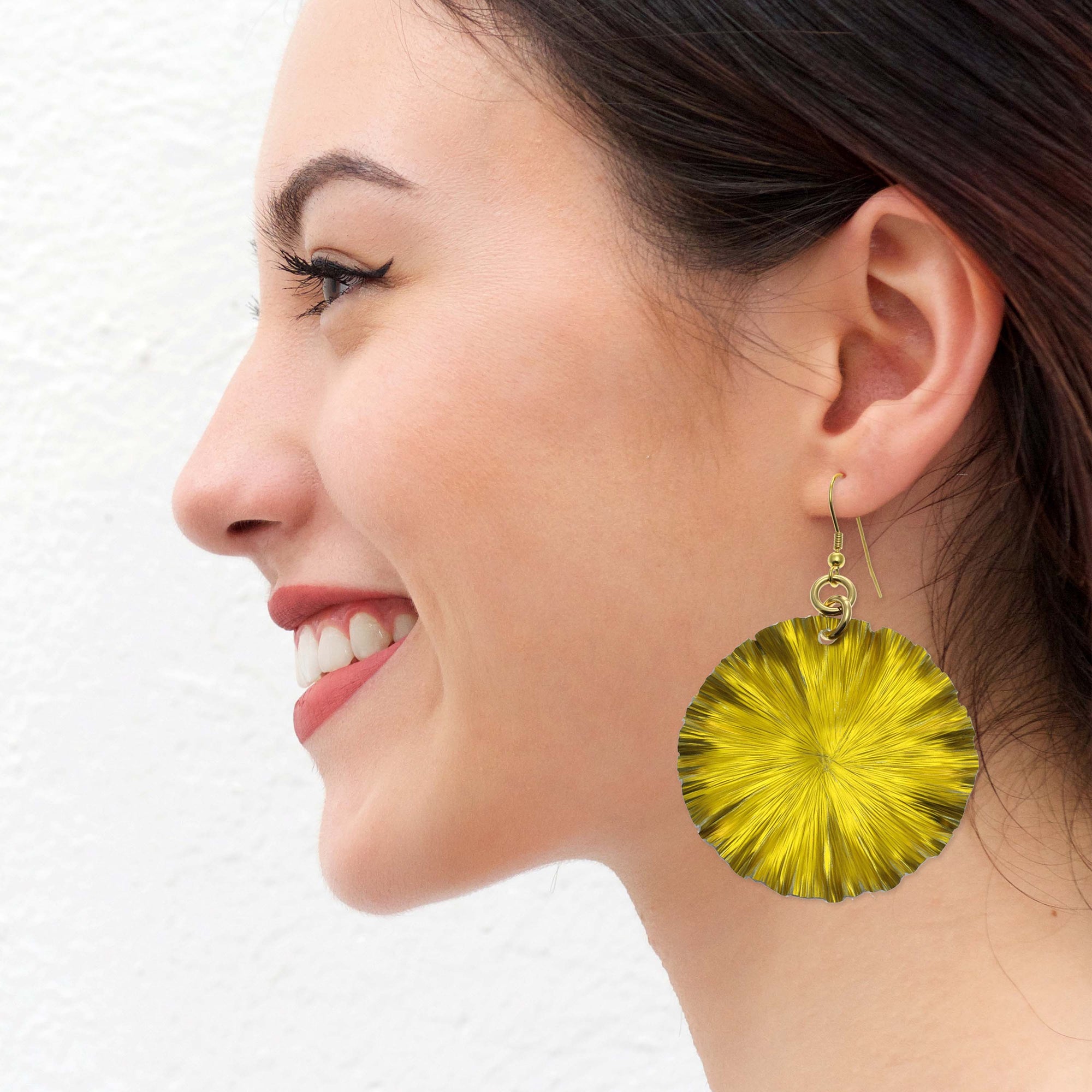 Chic Woman Wearing Large Canary Yellow Lily Pad Anodized Aluminum Leaf Earrings