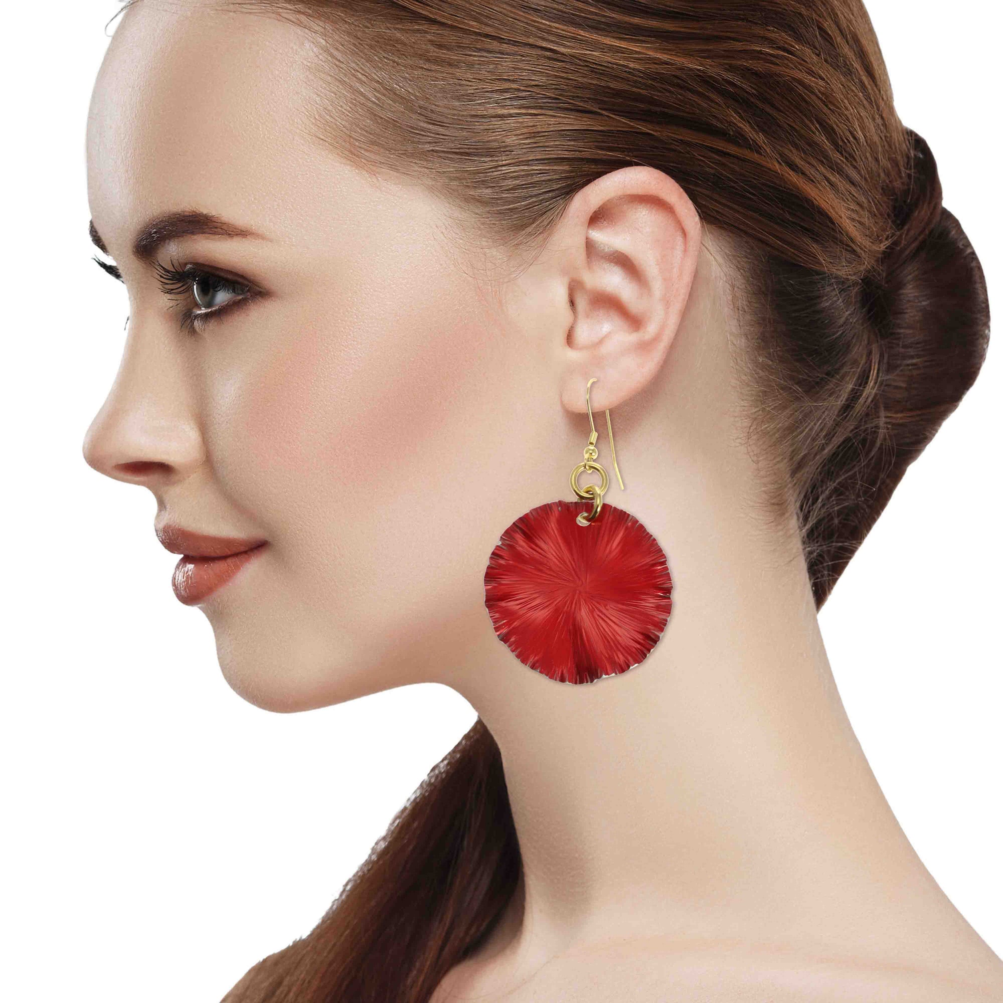 A Stunning Woman Wearing Large Red Anodized Aluminum Lily Pad Earrings