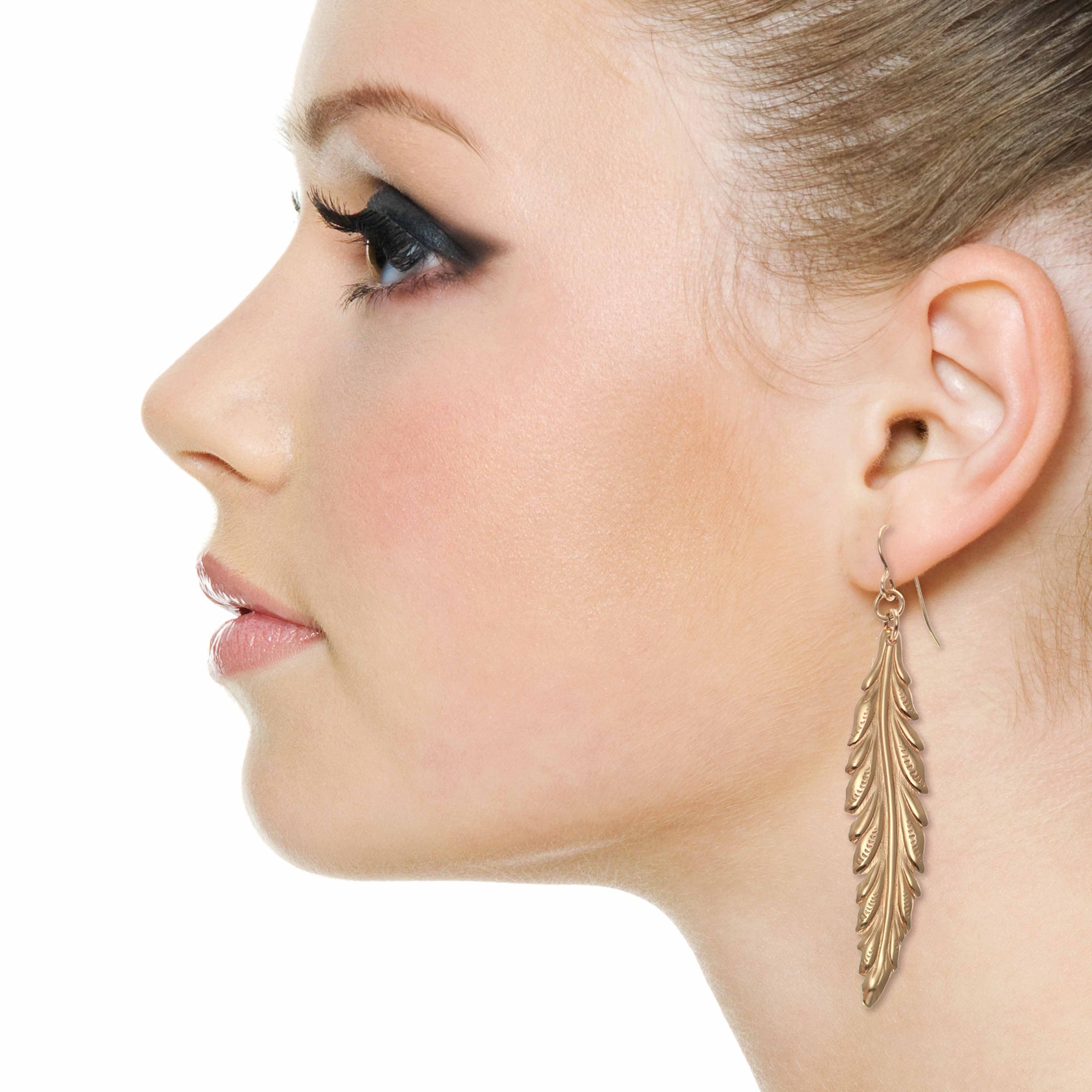 Elegant Woman Wearing Long Feather Bronze Drop Earrings