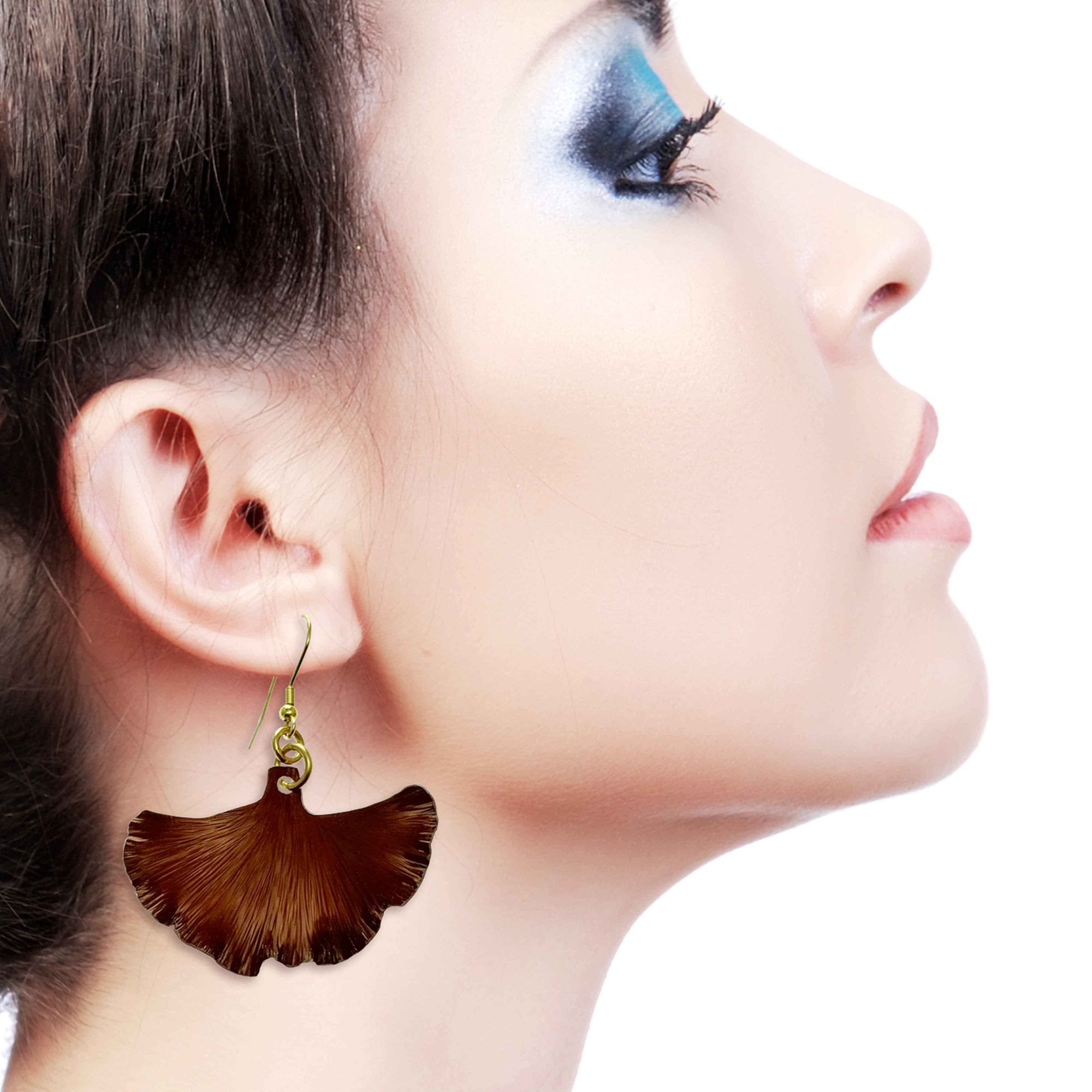 A Stunning Woman Wearing Medium Henna Brown Anodized Ginkgo Leaf Earrings