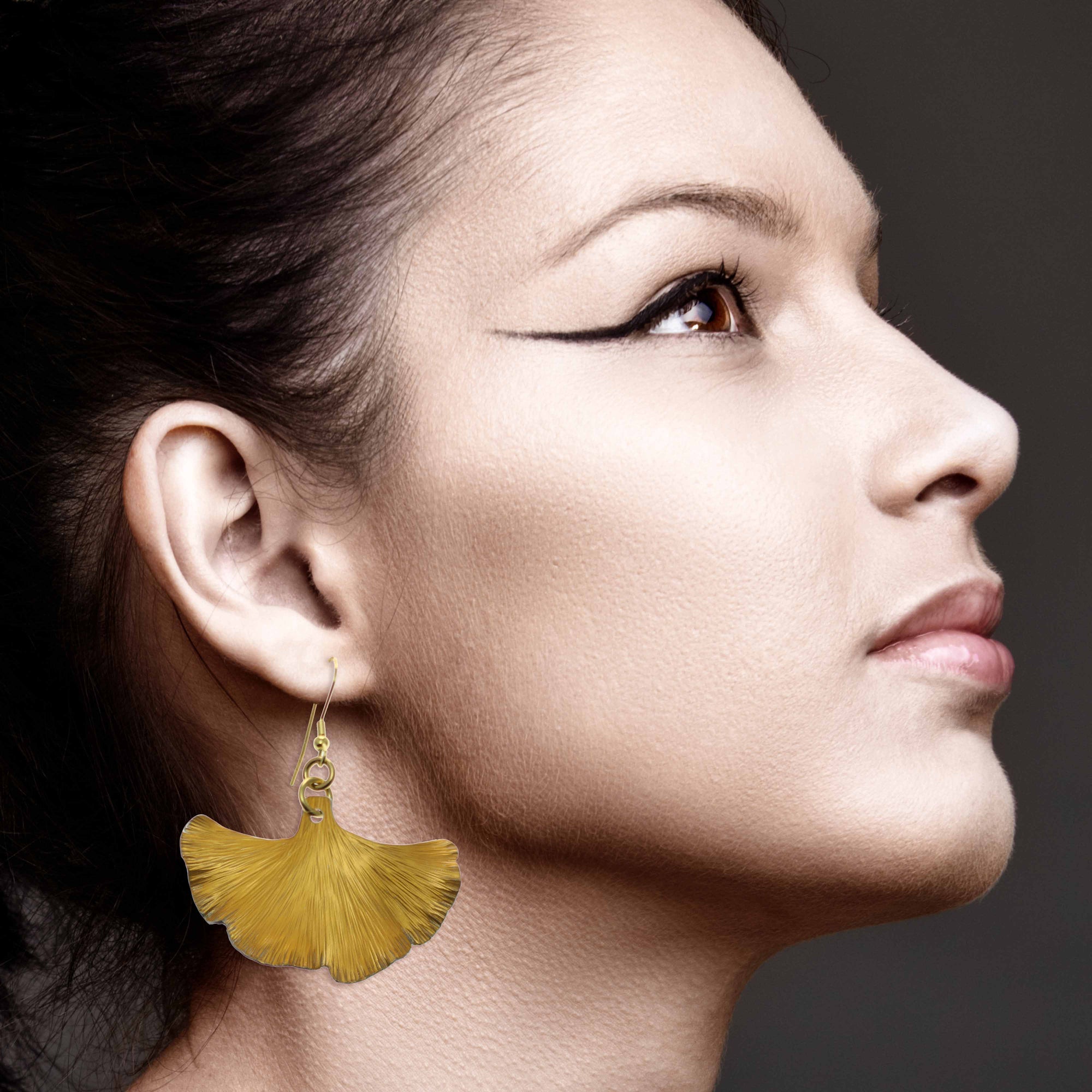 Stunning Woman Wearing Medium Light Orange Anodized Ginkgo Leaf Drop Earrings