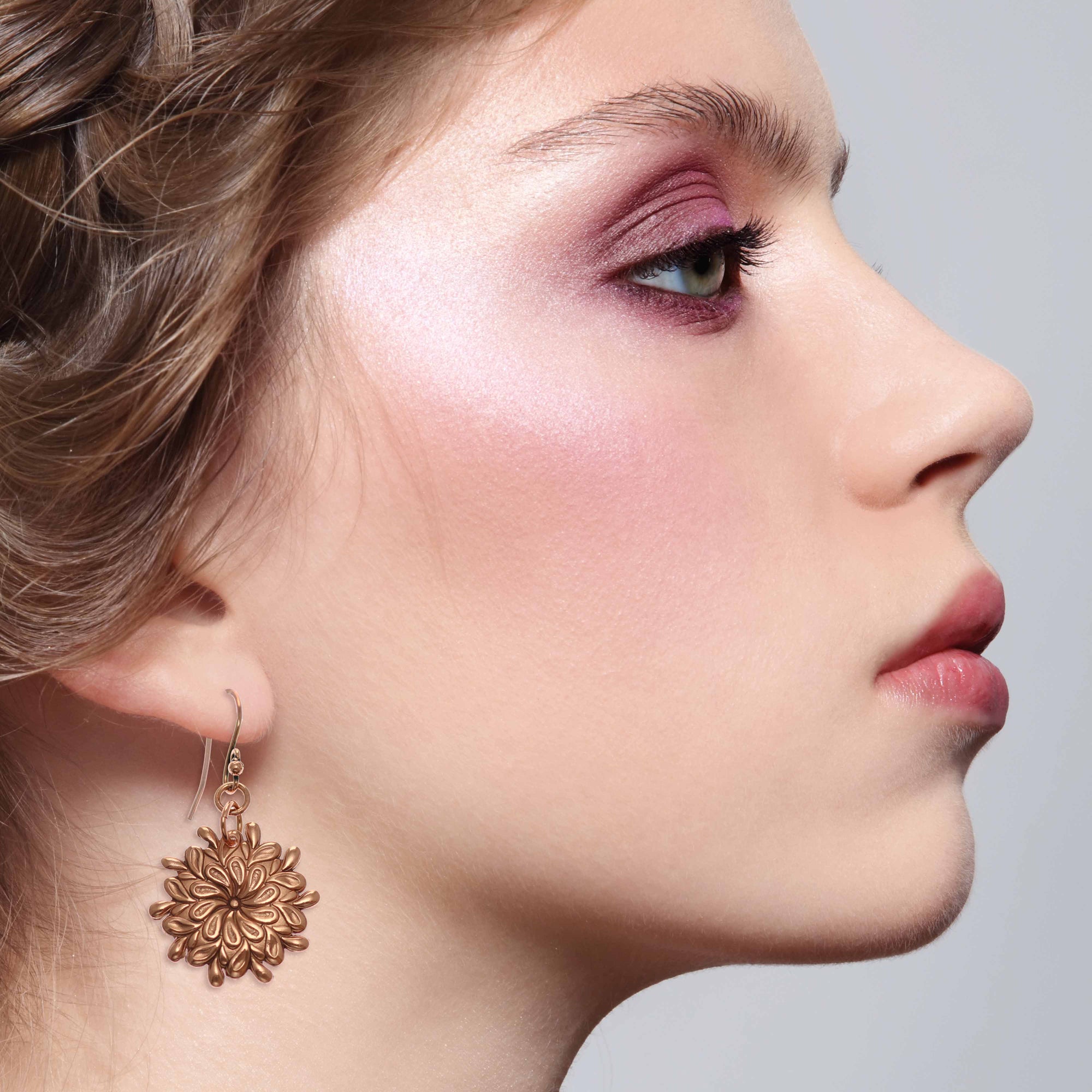 Stunning Female Model Wearing Paisley Burst Copper Drop Earrings