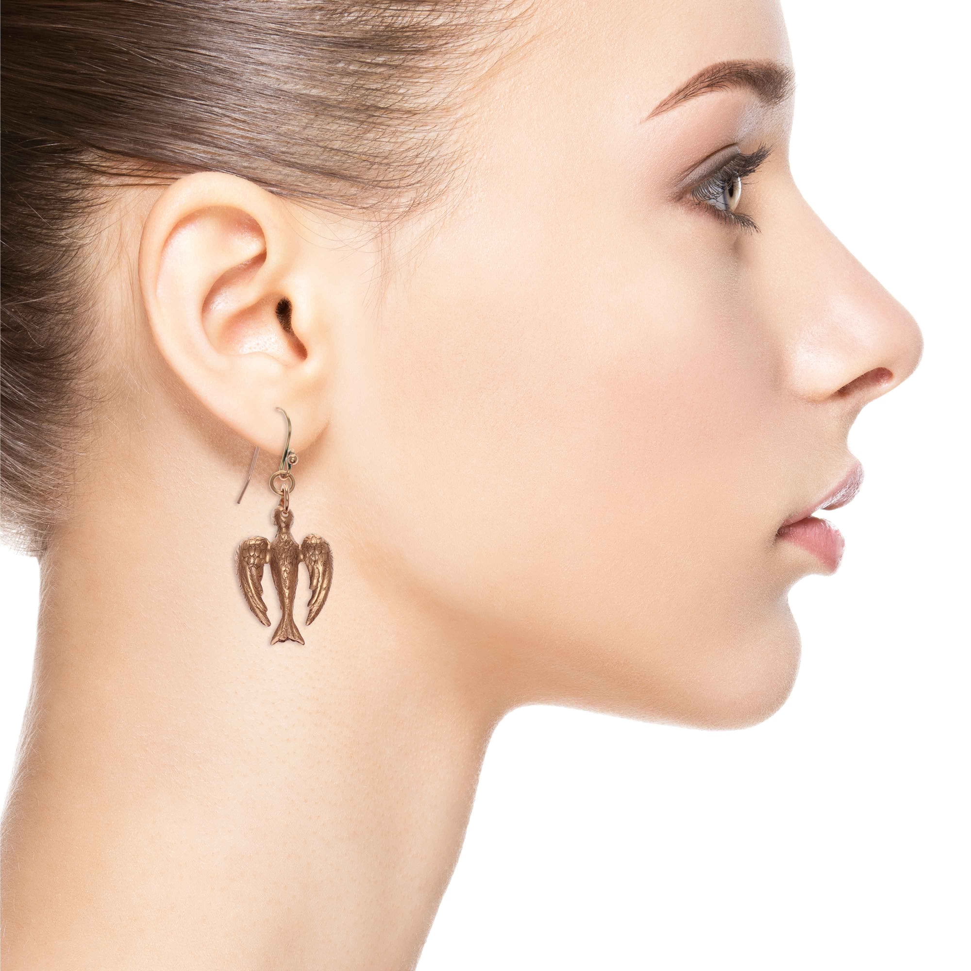 Glamorous Woman Wearing Peace Dove Copper Drop Earrings