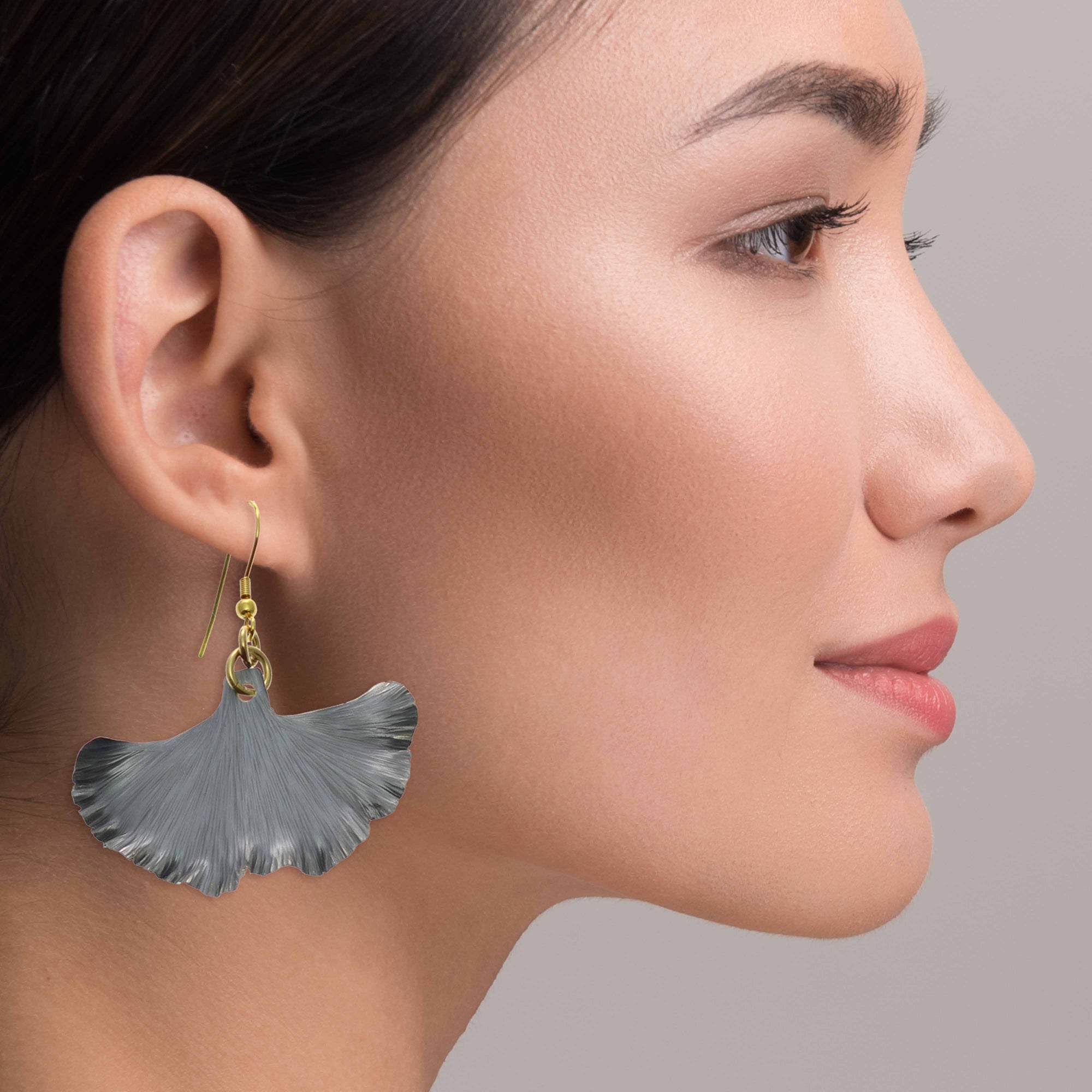 Elegant Woman Wearing Pewter Gray Anodized Aluminum Medium Ginkgo Leaf Earrings