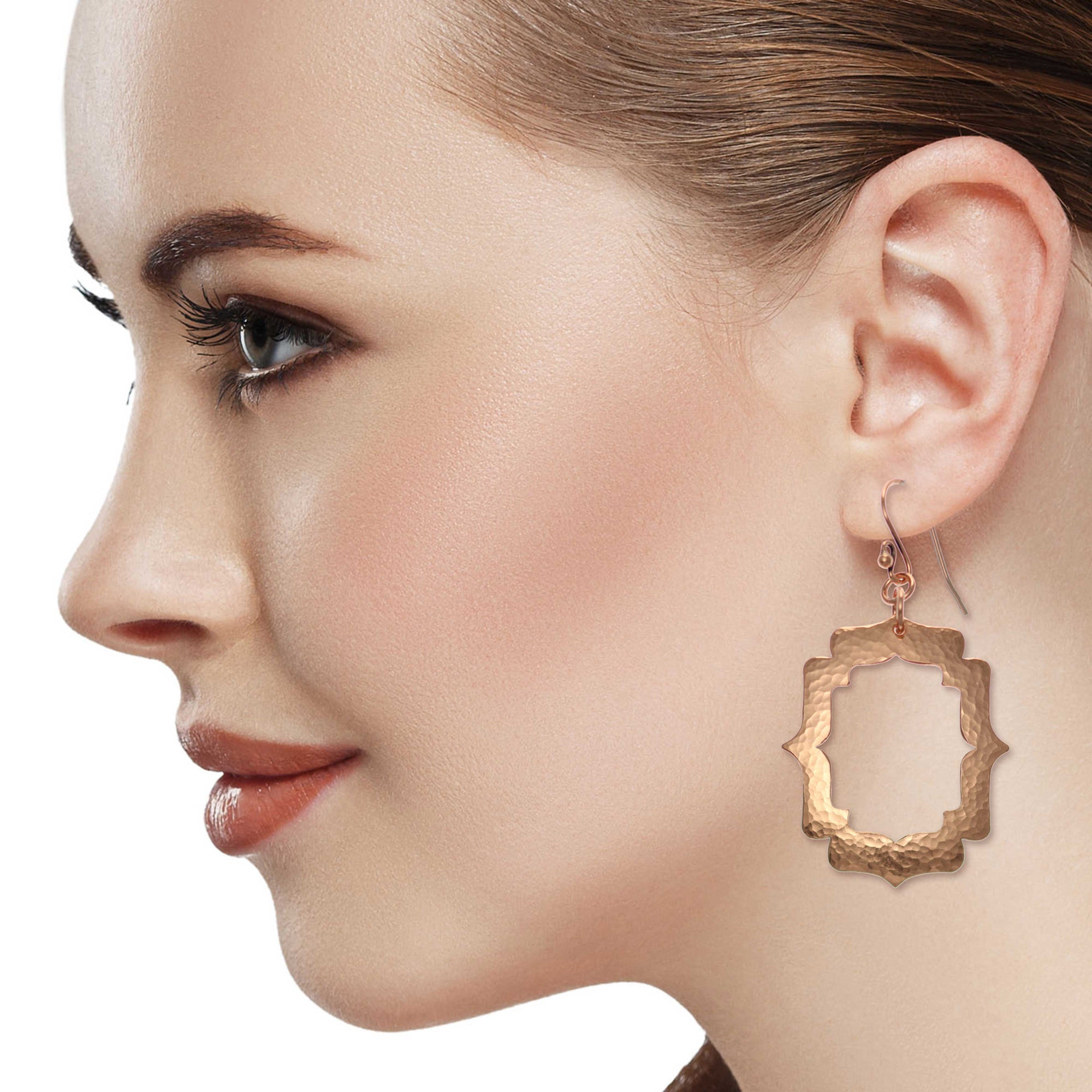 Stunning Female Wearing Pierced Hammered Copper Arabesque Shield Earrings