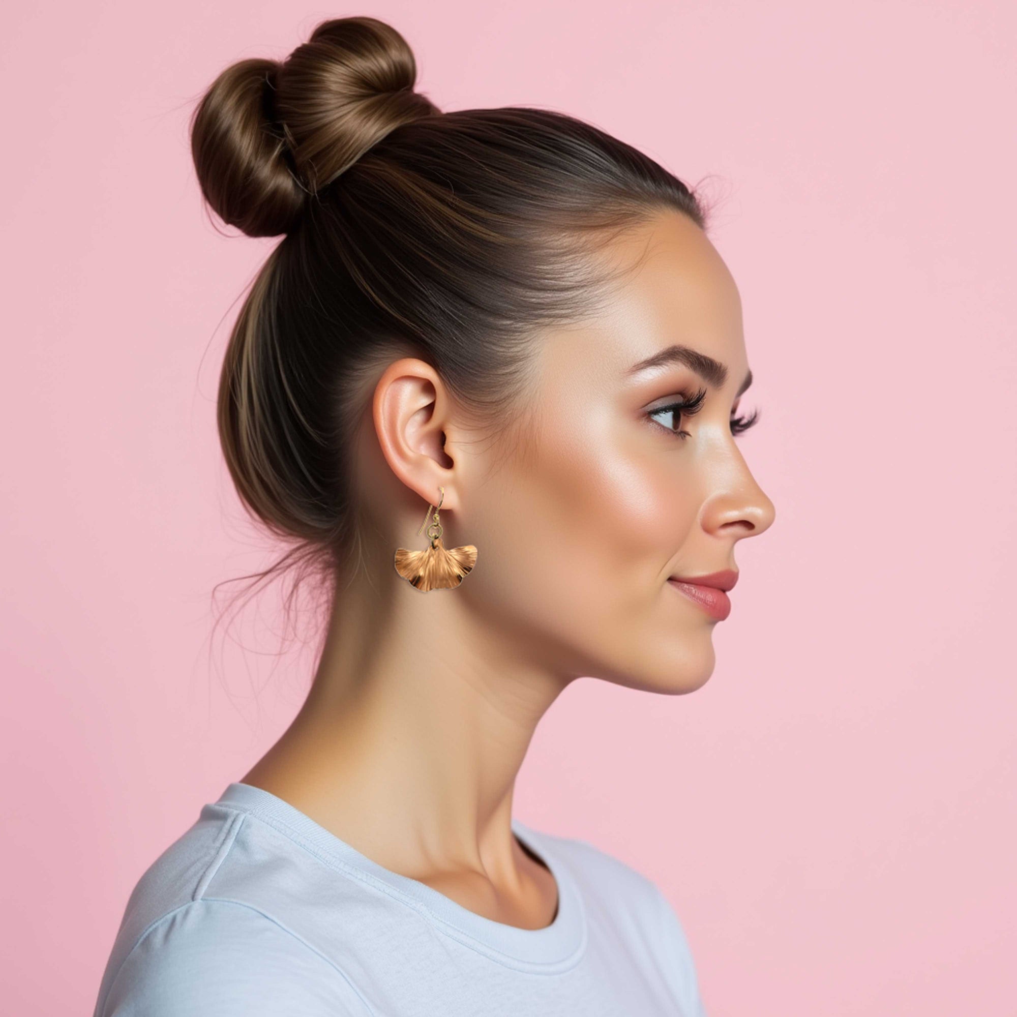 Elegant Woman Wearing Small Copper Ginkgo Leaf Earrings