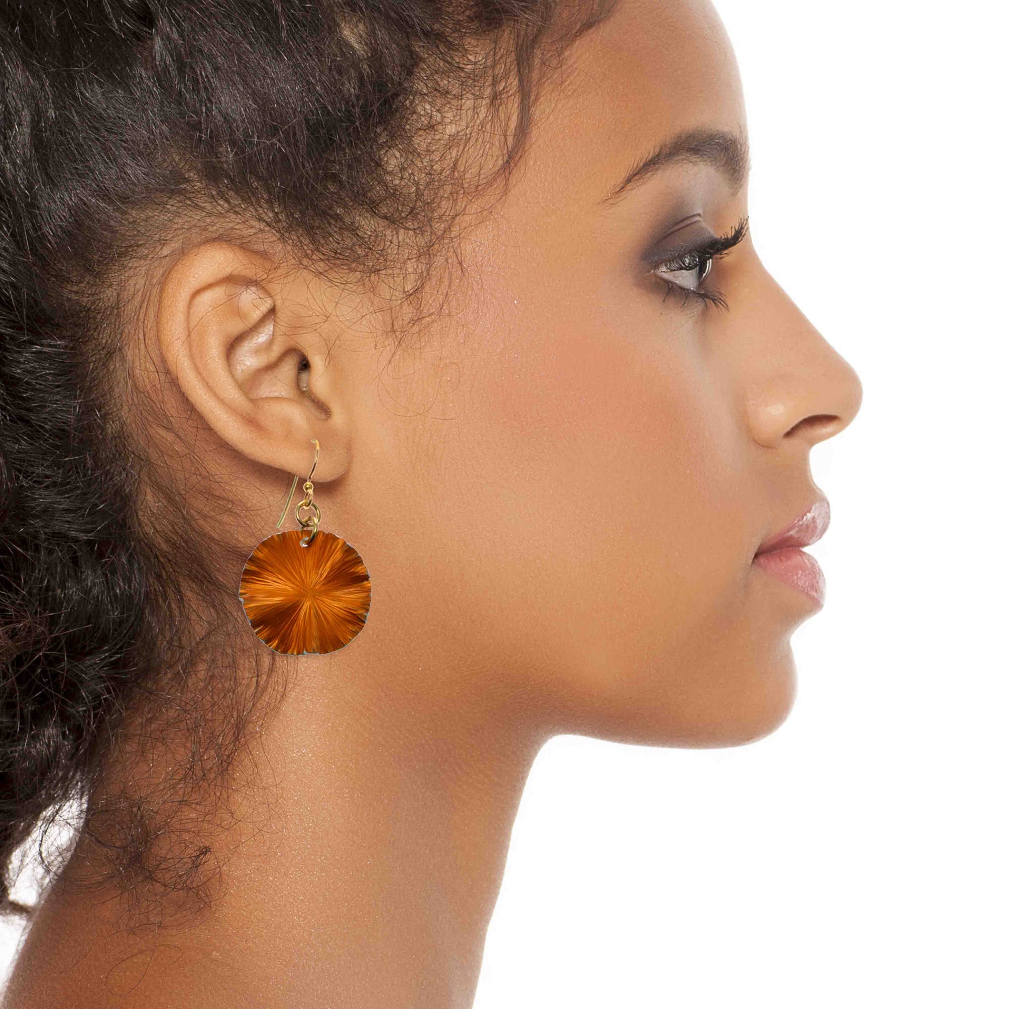 Woman Wearing Small Orange Anodized Aluminum Lily Pad Earrings