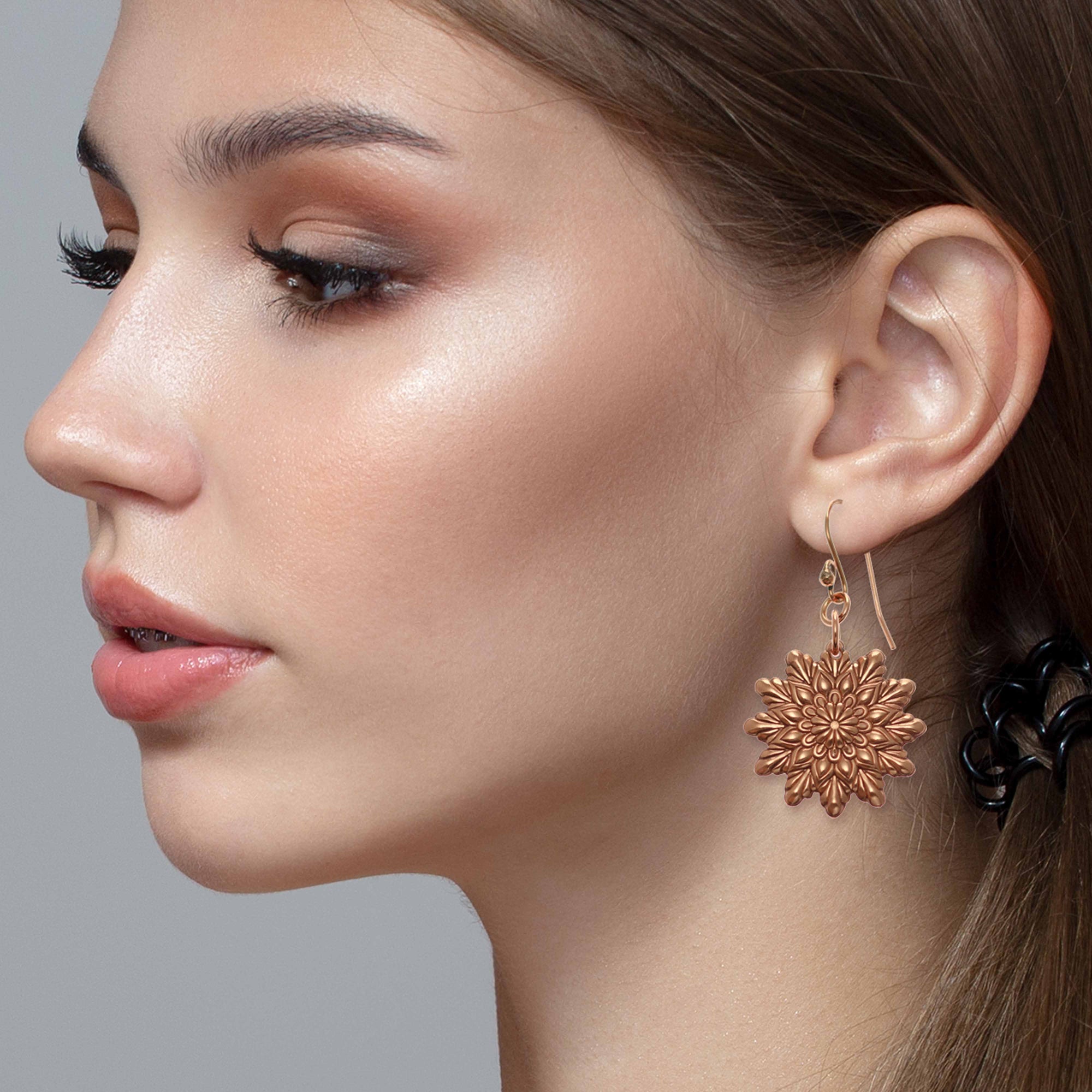 Fashionable Woman Wearing Starburst Mandala Copper Earrings 