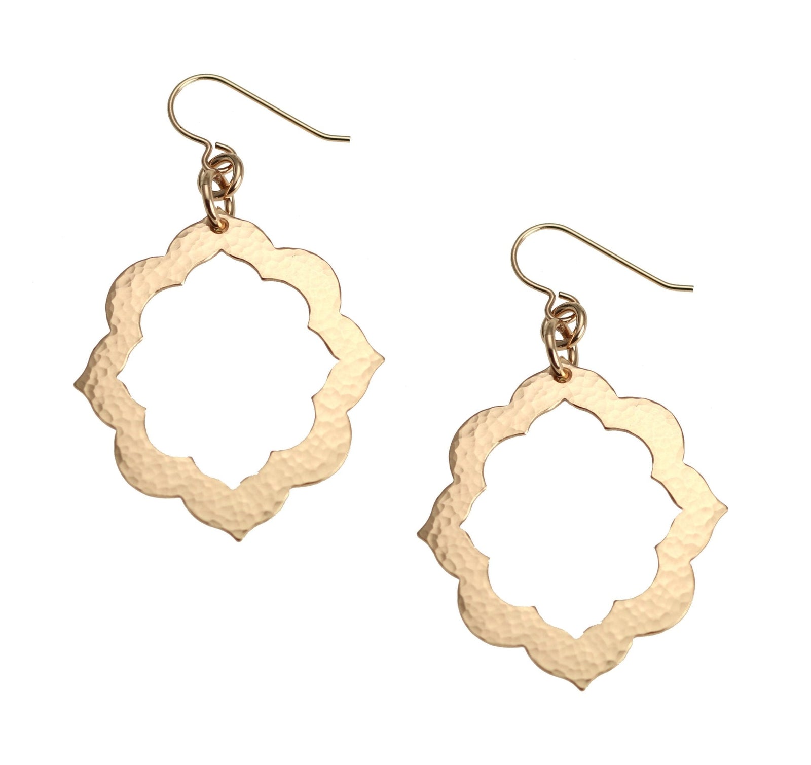 A Pair of Pierced Hammered Bronze Arabesque Flower Earrings on a White Background